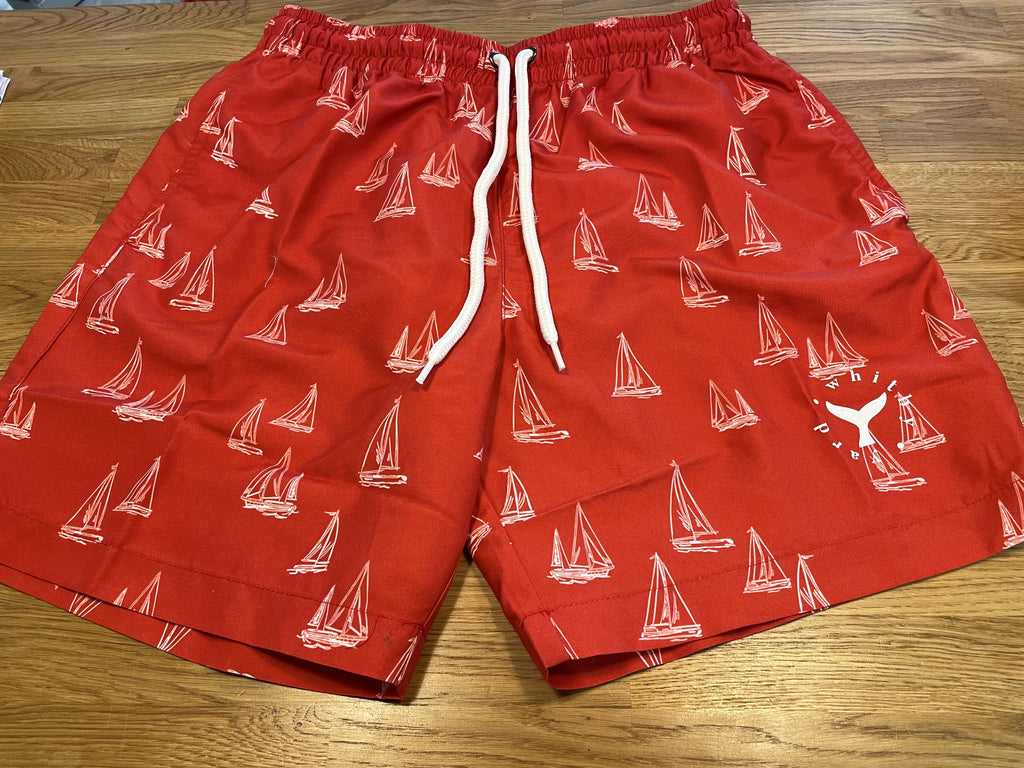 Men's Orange swim shorts with white sail boats