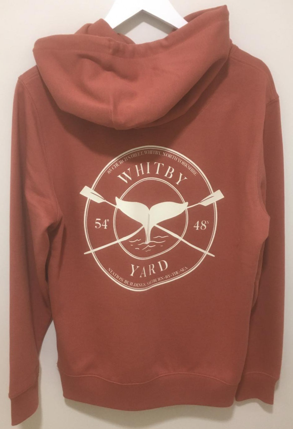 Unisex Rowing Whale Pullover Hoodie in red brick