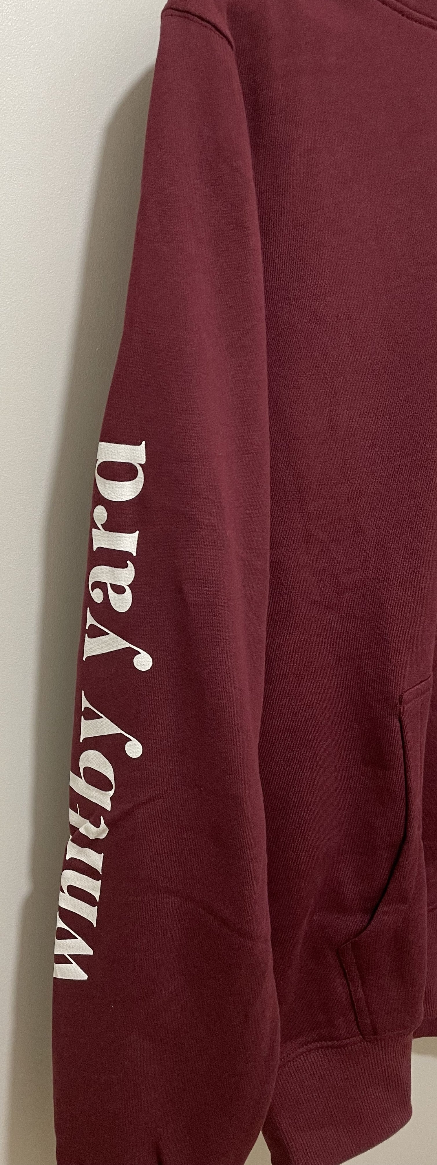 Unisex Pullover Hoodie in Burgundy with 'Whitby Yard' Text
